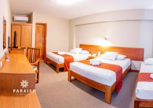 Postel nebo postele na pokoji v ubytování Hoteles Paraiso TRUJILLO