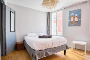 Posteľ alebo postele v izbe v ubytovaní Bel appt 42m² au cœur de Trouville 2mns de la mer