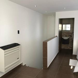 a bathroom with a sink and a toilet in a room at en lo de Pancho 3 in Río Gallegos +8 photos