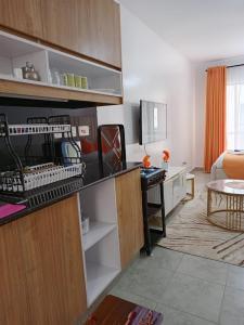 Kuchyň nebo kuchyňský kout v ubytování Hidden heaven studio fedha