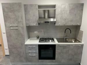 Η κουζίνα ή μικρή κουζίνα στο Perla MARINA +10 φωτογραφίες