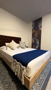 Postel nebo postele na pokoji v ubytování Star AV 37 HOTEL