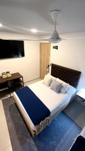 Postel nebo postele na pokoji v ubytování Star AV 37 HOTEL
