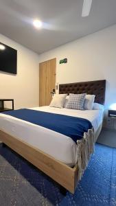 Postel nebo postele na pokoji v ubytování Star AV 37 HOTEL