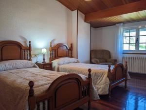 Ένα ή περισσότερα κρεβάτια σε δωμάτιο στο Casa Filomena