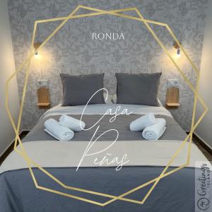 En eller flere senge i et værelse på Casa Peñas 1