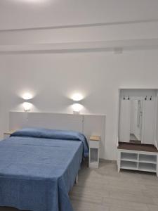 Letto o letti in una camera di Beach Rooms 2 Self Check-in