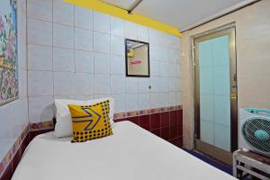 Postel nebo postele na pokoji v ubytování OYO Life 92651 Meir E-homestay Syariah + 23 fotografií