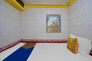 Postel nebo postele na pokoji v ubytování OYO Life 92651 Meir E-homestay Syariah