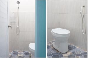 OYO 93695 Guest House Riharti Syariah的一间浴室