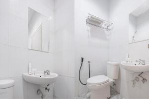 Koupelna v ubytování SUPER OYO 866 Idola Residence