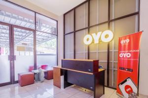 Posezení v ubytování SUPER OYO 866 Idola Residence