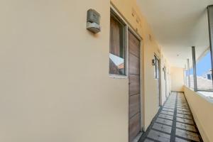 Фотография из галереи OYO Life 93300 Homestay Puri Anggrek Syariah - Wage в городе Сидоарджо