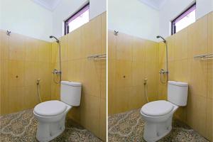 Koupelna v ubytování Super OYO 92437 Wahidin Guesthouse