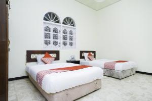 Imagen de la galería de Hotel O Penginapan Bidara Syariah, en Probolinggo
