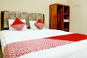 Photo de la galerie de l'établissement Hotel O Homestay Juwita Perdana Syariah, à Tanjungraya 21 autres photos