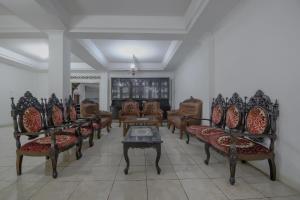 Гостиная зона в OYO 3242 Penginapan Saa'ada Syariah +19 фотографий