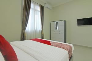 TV a/nebo společenská místnost v ubytování Danceneter Padang formerly Utama Residence