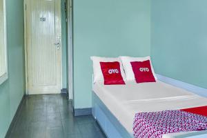 Fotografie z fotogalerie ubytování OYO Life 91205 Rindang Guesthouse Syariah v destinaci Karawang