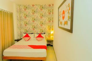Postel nebo postele na pokoji v ubytování OYO 354' 32 Guest House