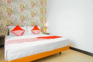 Postel nebo postele na pokoji v ubytování OYO 354' 32 Guest House