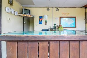 Fotografie z fotogalerie ubytování Super OYO 1654 Maha Bharata Kuta Inn v destinaci Legian