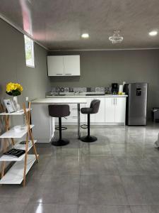 Kuchyň nebo kuchyňský kout v ubytování Apartamento Einoah