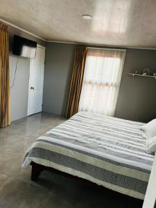 Postel nebo postele na pokoji v ubytování Apartamento Einoah