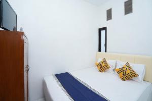 TV o dispositivi per l'intrattenimento presso SPOT ON 2479 Berkah Residence Syariah