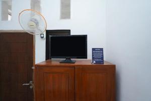 TV o dispositivi per l'intrattenimento presso SPOT ON 2479 Berkah Residence Syariah
