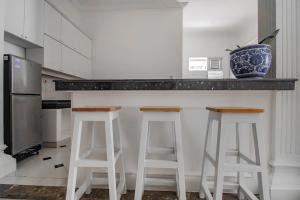 Kuchyň nebo kuchyňský kout v ubytování Super OYO Capital O 90342 Kemang Garden
