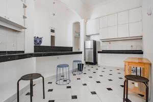 Kuchyň nebo kuchyňský kout v ubytování Super OYO Capital O 90342 Kemang Garden