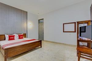 Postel nebo postele na pokoji v ubytování OYO Life 92686 Lanaya Guesthouse Syariah