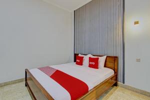 Postel nebo postele na pokoji v ubytování OYO Life 92686 Lanaya Guesthouse Syariah
