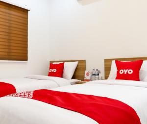 Fotografie z fotogalerie ubytování OYO 1191 Monalisa Residence And Cafe v destinaci Padang