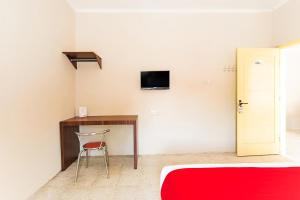 TV a/nebo společenská místnost v ubytování OYO 3252 Lansano Residence Syariah