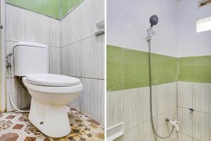 Ein Badezimmer in der Unterkunft OYO Life 90701 Kost Syariah Deris