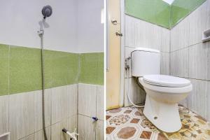 Ein Badezimmer in der Unterkunft OYO Life 90701 Kost Syariah Deris