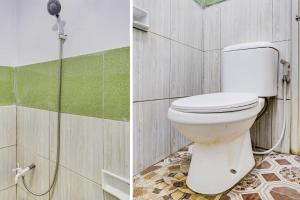 Ein Badezimmer in der Unterkunft OYO Life 90701 Kost Syariah Deris