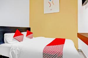 Posteľ alebo postele v izbe v ubytovaní Super OYO 90692 Point Hostel