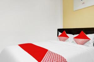 Posteľ alebo postele v izbe v ubytovaní Super OYO 90692 Point Hostel