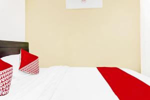 Posteľ alebo postele v izbe v ubytovaní Super OYO 90692 Point Hostel