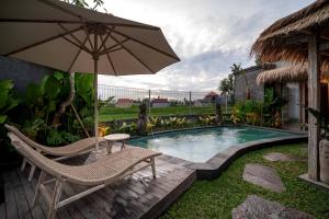 Piscina di The Macaw Ubud Green Uma Villa o nelle vicinanze