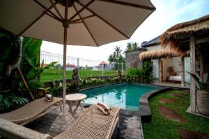 Piscina di The Macaw Ubud Green Uma Villa o nelle vicinanze