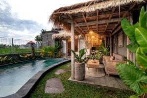 Piscina di The Macaw Ubud Green Uma Villa o nelle vicinanze