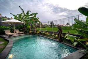 Piscina di The Macaw Ubud Green Uma Villa o nelle vicinanze
