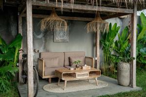 Giardino di The Macaw Ubud Green Uma Villa