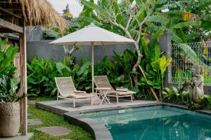 Piscina di The Macaw Ubud Green Uma Villa o nelle vicinanze