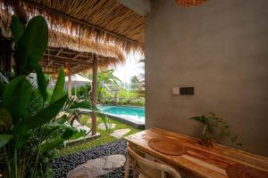 Piscina di The Macaw Ubud Green Uma Villa o nelle vicinanze