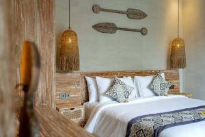 Letto o letti in una camera di The Macaw Ubud Green Uma Villa
